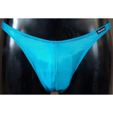 Costume bodybuilding da competizione turchese laminato Thefreeway Art. DN109 in Lycra, vista frontale su manichino