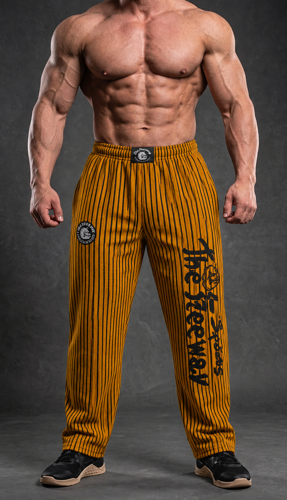 Bodybuilder con pantaloni unisex senape a righe nere Thefreeway con logo nero sulla gamba