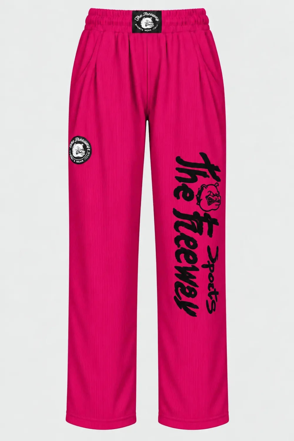 Thefreeway unisex training pants in fuchsia worn by a female model, full-body